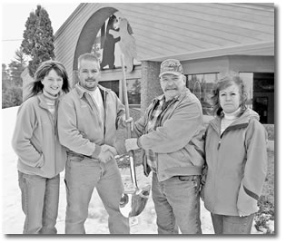 Hissom Family Holding a shovel